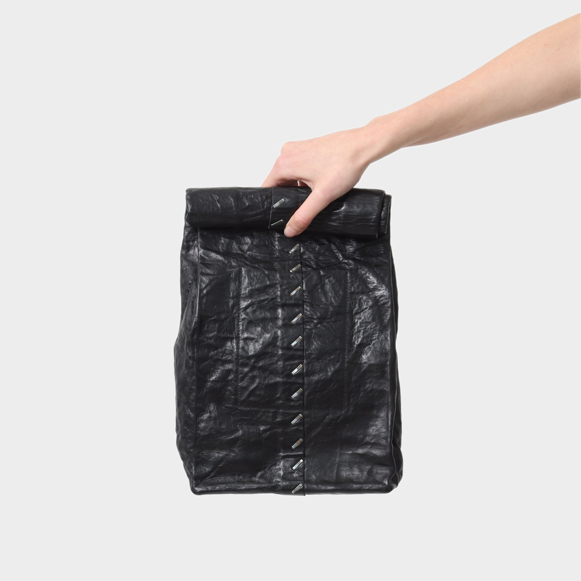 Daniele Basta Leather staple detail lunchbox clutch